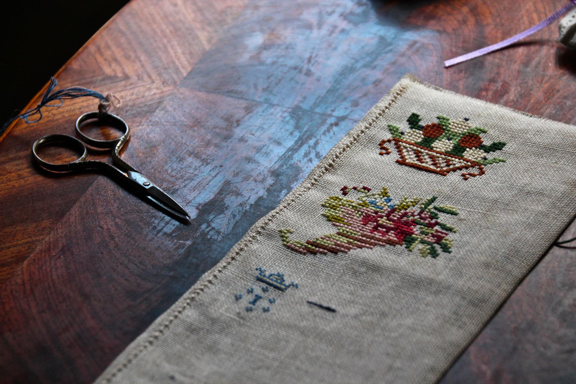 Embroidered samples on table